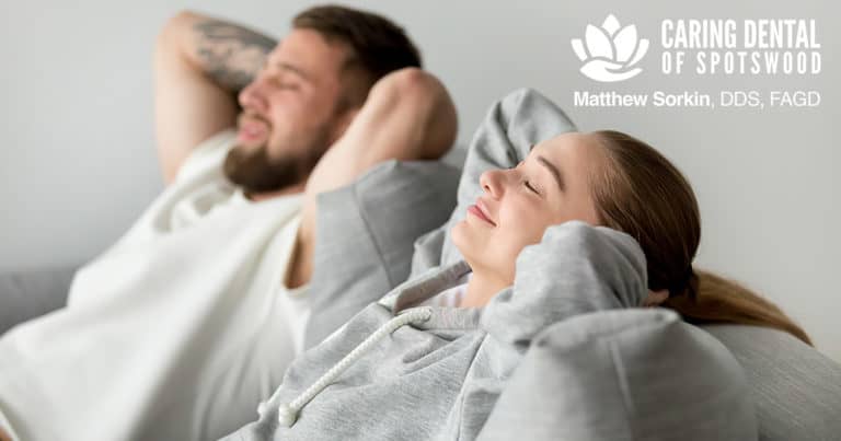 couple sitting back and relaxing