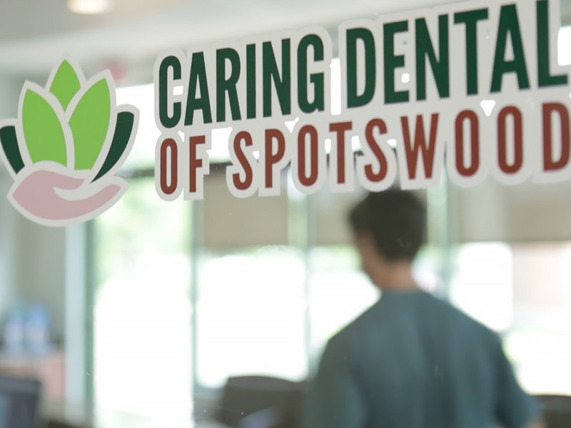 Caring Dental of Spotswood door sign