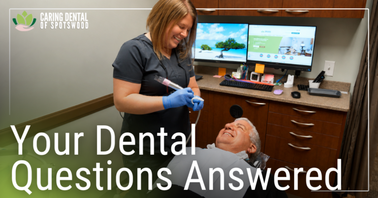 patient in chair smiling at hygenist